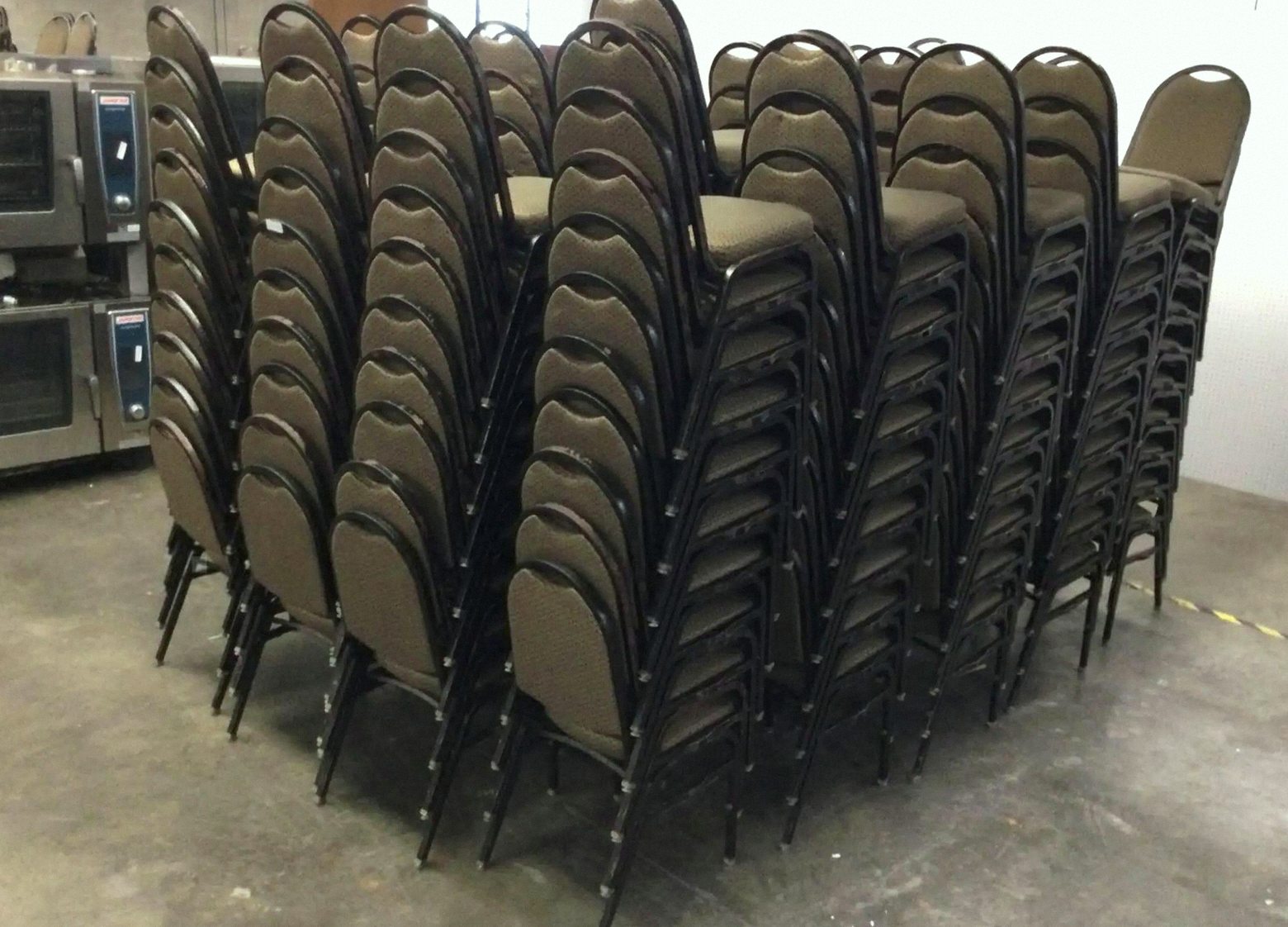 Tan Pattern Banquet Chairs - Black Frame Stacking