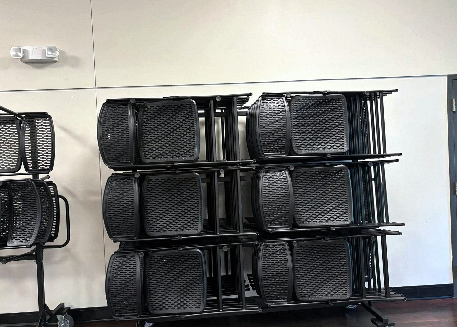 Black Resin Folding Chairs with Carts — photo 1